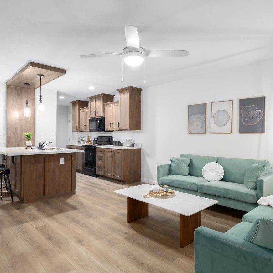 living-room-modular-home-green-couches